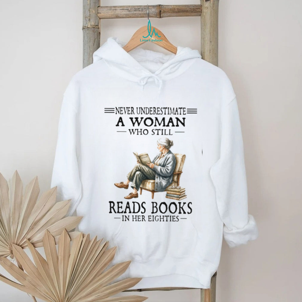 Never Underestimate A Woman Who Still Reads Books In Her Eighties Shirt