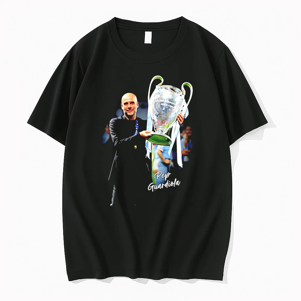 Officials Pep Guardiola Manchester City 2026 Champions Holding Trophy Graphic Tee Premium T Shirt
