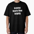 Grateful Hearts Glow Brightly (White Text) by QuoteeApparel